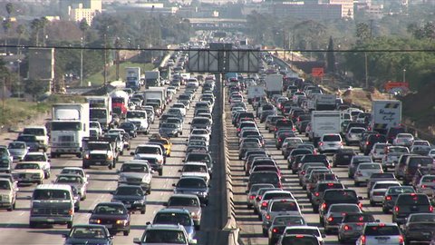 Los Angeles, CA - CIRCA February 2006: Sitting in the hot California sun on the traffic riddled freeway, blasting the air conditioner and grooving to the radio, is the official state past time.