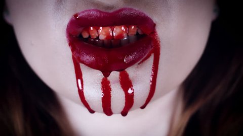 4K Horror Close-Up of Vampire Red Lips with Blood