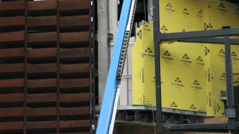 BROOKLYN, NY - FEBRUARY 15, 2012: Construction workers build the Barclays Center in Brooklyn, NY