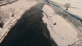 Aerial footage of winter morning fog over Olt river waters in Romania