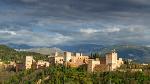 Cityscape of Granada.  Alhambra palace and fortress complex.  Andalusia, Spain. Time lapse