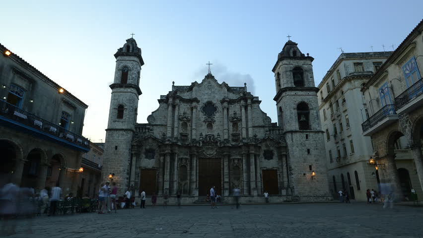 City view of Havana, Cuba with the cathedral and square at dusk. Time-lapse