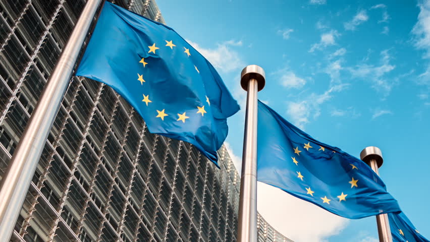 European Union flags waving in the wind in front of European Commission building. Brussels, Belgium. Full HD, 1080p Royalty-Free Stock Footage #24788486