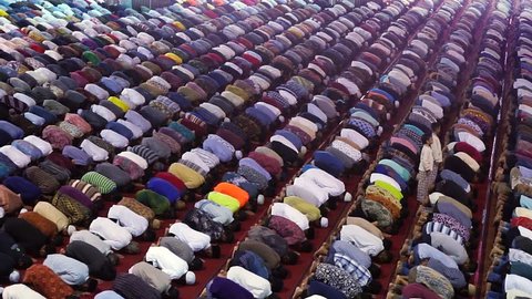 JAKARTA, JANUARY 30, 2017: Crowd devout muslim men praying together on Friday prayer time in mosque