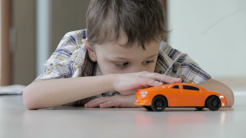 Sad little boy lying on the floor at home  at the day time | Shutterstock HD Video #24789626