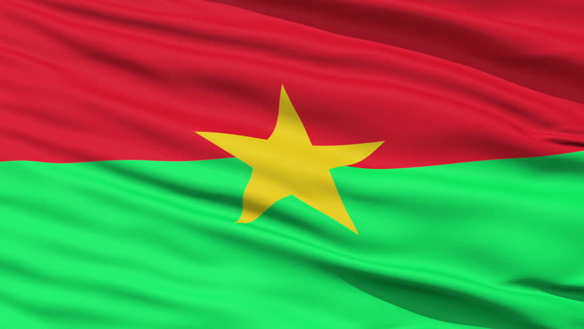 Closeup cropped view of a fluttering national flag of Burkina Faso