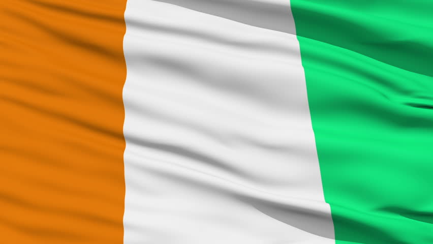 Closeup cropped view of a fluttering national flag of Cote d'Ivoire