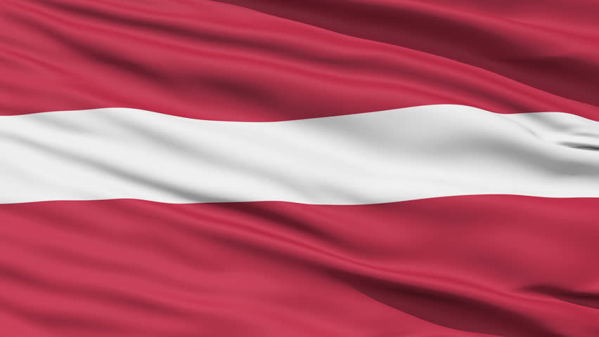 Closeup cropped view of a fluttering national flag of Latvia
