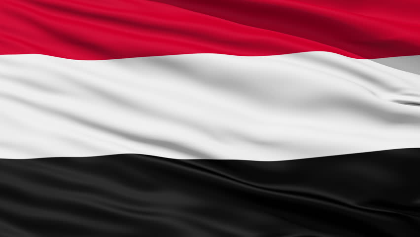 Closeup cropped view of a fluttering national flag of Yemen