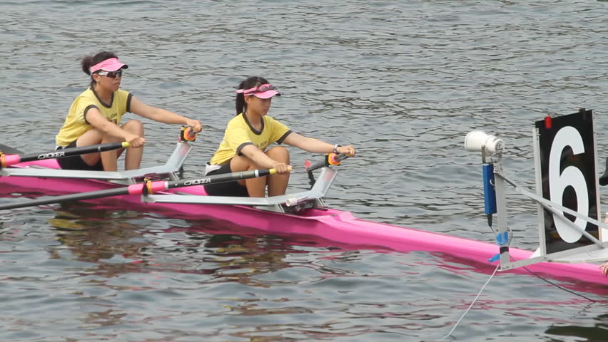 HONG KONG, CHINA - NOVEMBER 5: Woman Rowing team at the start of a regatta on