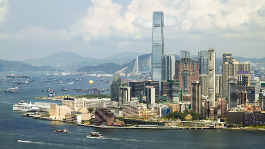 HONG KONG, CHINA - AUGUST 6: Time lapse of Hong Kong Victoria Harbor and Kowloon