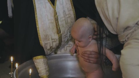 The baptism of a child in the church