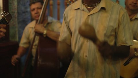 the cuban band eco caribe filmed performing in the bodaguita del medio bar in havana. all band members are model released. 