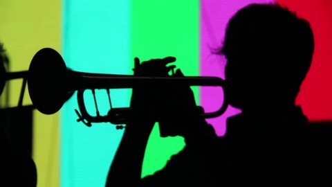 Silhouette of a trumpet player Stock Video