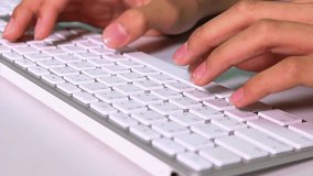 Thai student boy hands typing on a Thai computer keyboard. Typing concept.