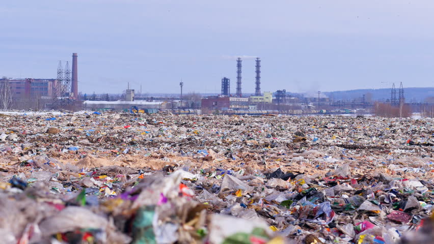 Garbage dump. Industrial factory on a background. Enviroment pollution concept. | Shutterstock HD Video #24819743