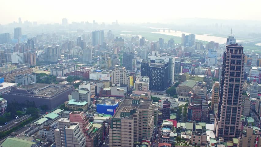 Aerial view of Taipei city, located in the north of the island of Taiwan. Taipei is home to various world-famous architectural or cultural landmarks. 4K.