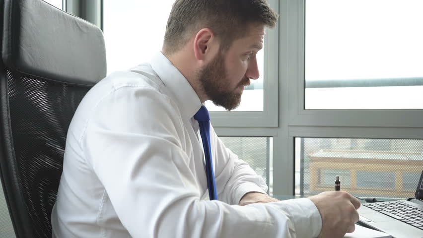 Businessman making notes, drinking coffee Slider and pan shot | Shutterstock HD Video #24835559