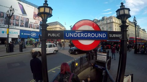 PICCADILLY CIRCUS, LONDON - MARCH 9, 2017. Amazing footage filmed in 4K using a large jib giving unusual and unique views of Piccadilly Circus, the Underground station, the crowds and buses,  Clip 14