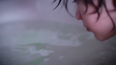 Little Girl Leans Against Glass の動画素材 ロイヤリティフリー Shutterstock
