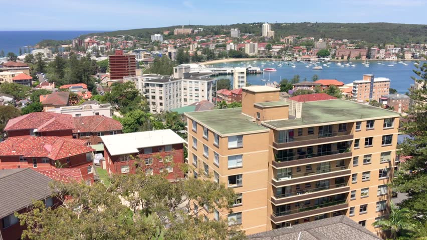 Sydney, Manly Beach buildings and coastline.
