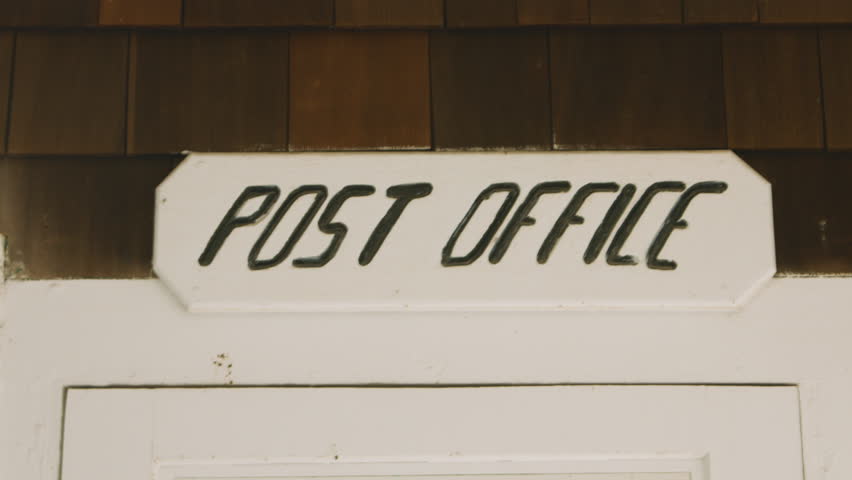 Post office sign at the beach