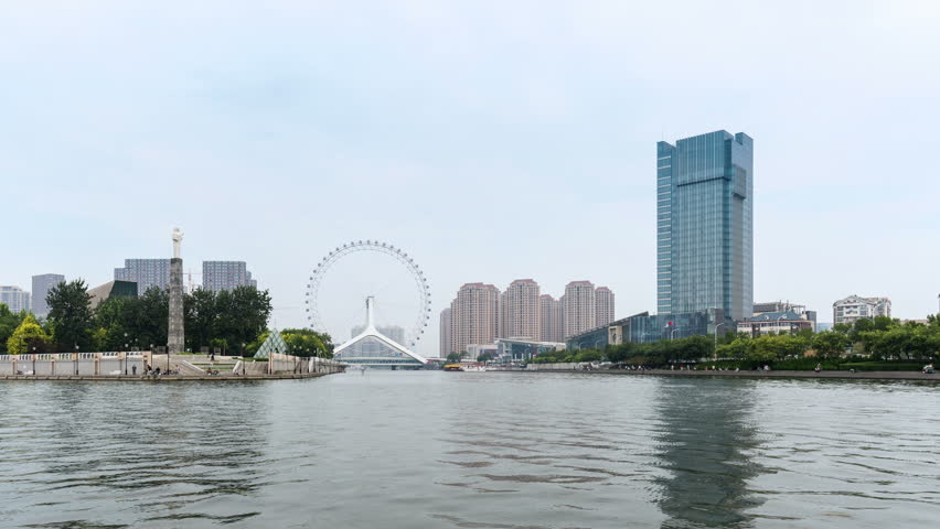 time lapse of haihe river landscape , ferris wheel in tianjin