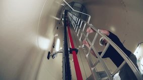 Worker climbs up metal ladder - Powered by Shutterstock - Get 15% off with code: PIKWIZARD15