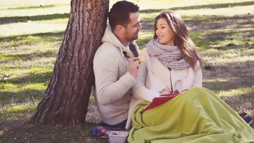 Loving couple kidding outdoors