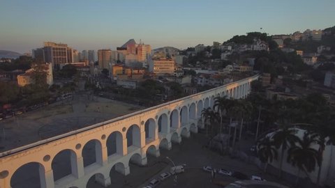 Rio de Janeiro Aerials: Flying over the Arches of Lapa at sunset Stock Video