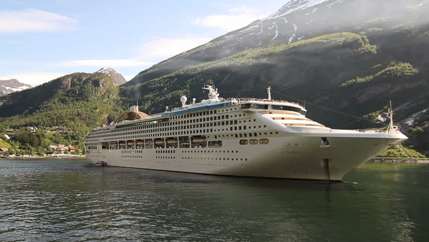GEIRANGER, NORWAY - JUNE 21: Cruise ship Oceania in the harboard in a beautiful