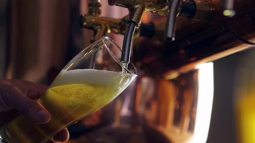 Bartender Pouring Beer In The Bar. Close-up  | Shutterstock HD Video #24886097