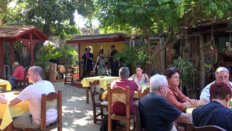 CUBA, - NOVEMBER 06:
Visitors in the La Parranda Restaurant with the performance of the Cuban music band.
November 06, 2016 in Trinidad, Sancti Spiritus, Cuba