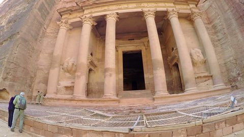 PETRA, JORDAN CIRCA 2013: Low angle view of the facade of the Treasury building in the ancient Nabatean ruins of Petra, Jordan