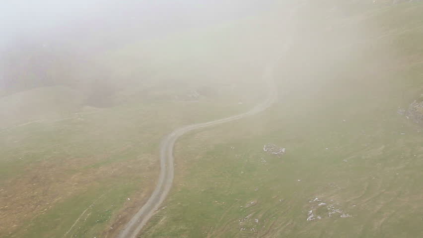 Trail road in the mountain.
Fog and lateral air traveling.
1080p 29.97fps