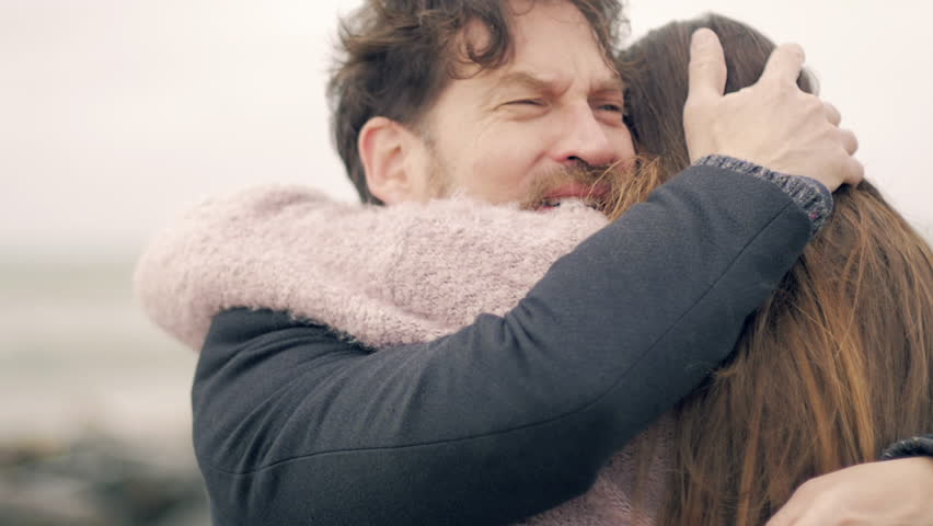 Handsome man crying hugging love of his life Royalty-Free Stock Footage #24908861