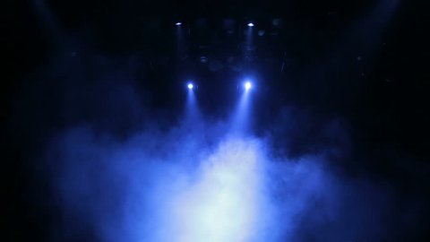 Stage special effects. Theatrical smoke. The spotlight on the stage of the theatre during the performance.