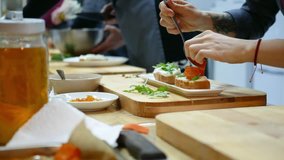 Cooking class, trainees learning in the kitchen. - Powered by Shutterstock - Get 15% off with code: PIKWIZARD15