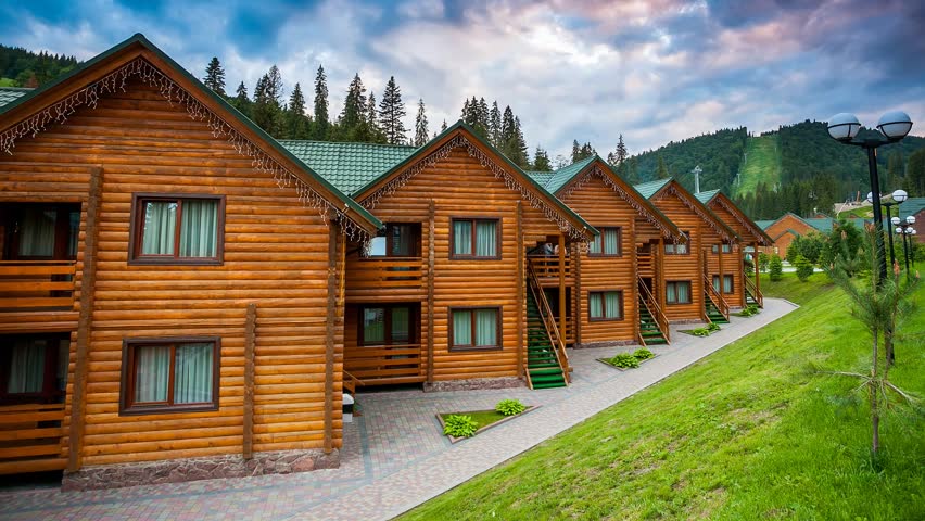 Tourist homes on the slopes. Picturesque and gorgeous scene. Location place ski resort, Carpathian, Ukraine Europe. Explore the world