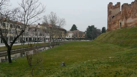 The canal of Castelfranco Veneto and the city walls
