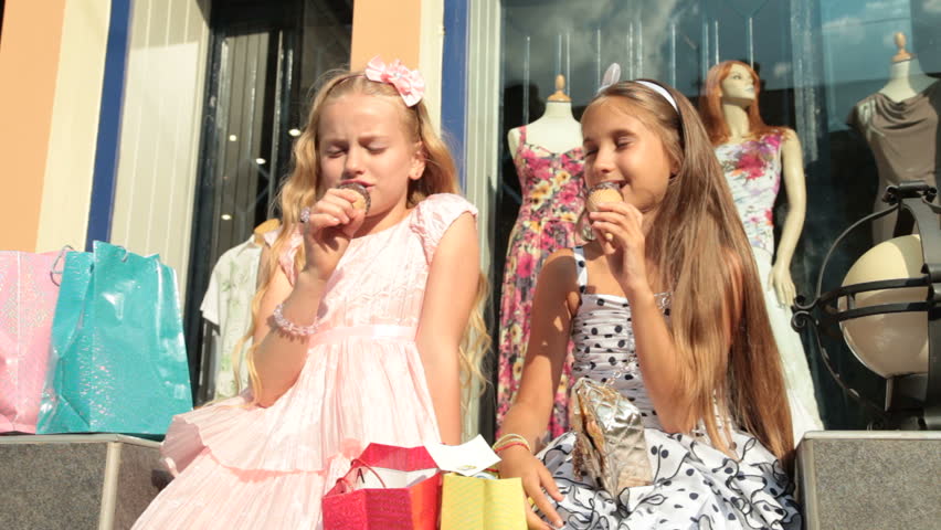 Little Shoppers near Store Window