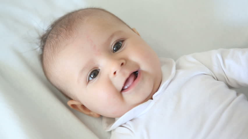 smiling baby face in medium shot video
