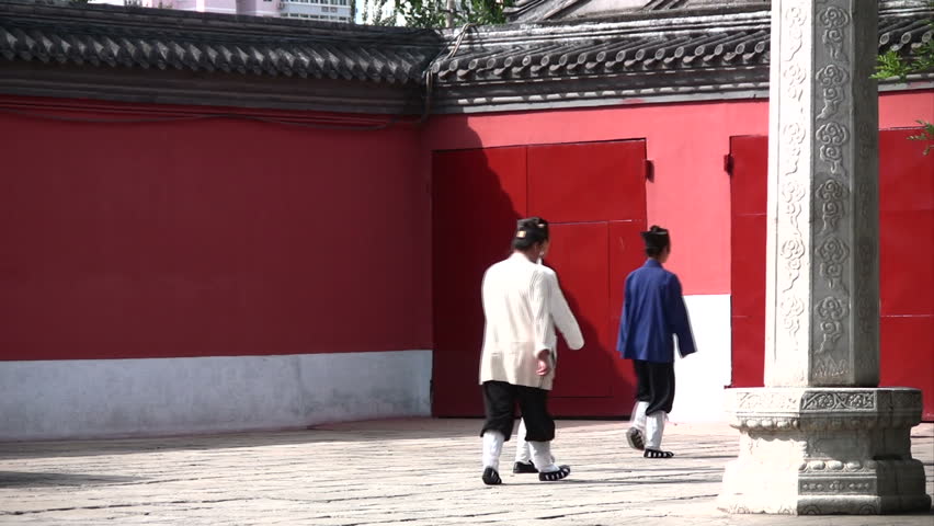 White monk black monk in Beijing Lama Temple 
Beijing, China - SEPTEMBER 25: white monk black monk in Beijing Lama Temple 25/09/2008