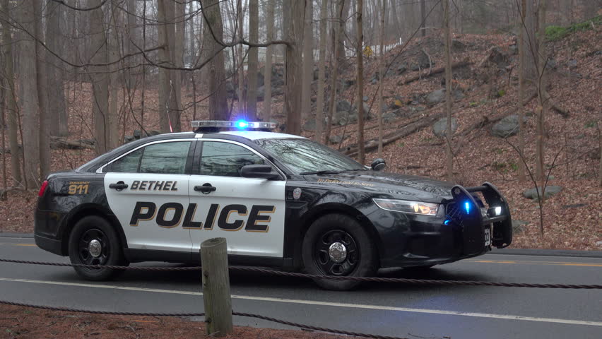 Police car on a country road