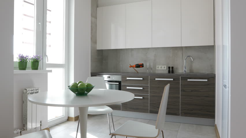4K. Interior of modern kitchen in scandinavian style. Motion panoramic view. | Shutterstock HD Video #24968234
