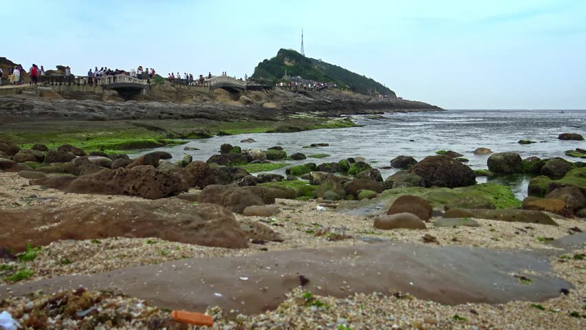 4K beautiful coastal landscape of Yehliu Geopark at Wanli of New Taipei City of Taiwan. Mushroom-shaped rock strange rocky landscape. Honeycomb stone erosion disk-Dan