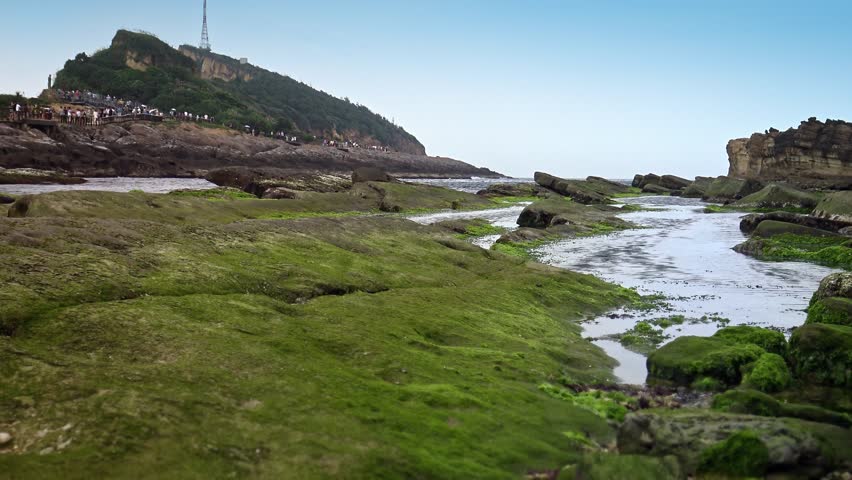 4K beautiful coastal landscape of Yehliu Geopark at Wanli of New Taipei City of Taiwan. Mushroom-shaped rock strange rocky landscape. Honeycomb stone erosion disk-Dan