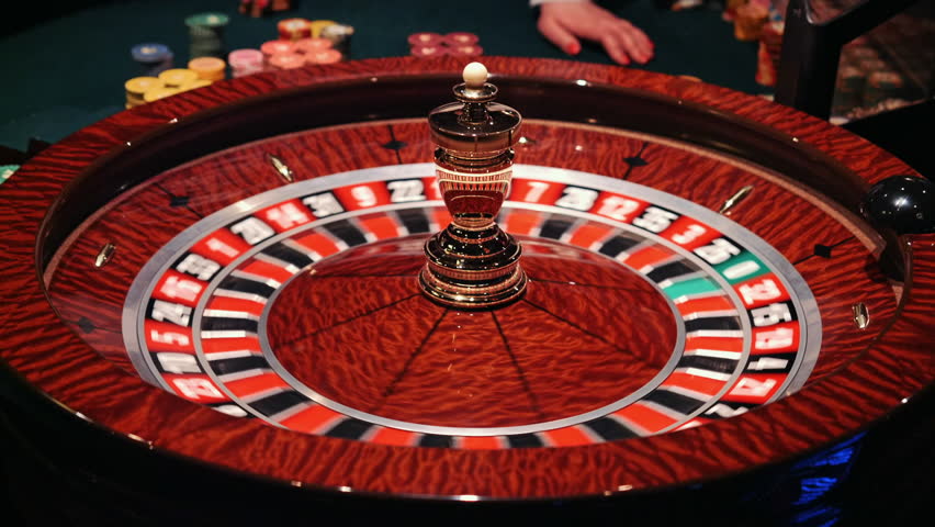 The small ball falls into the slot as the Roulette Wheel spins. | Shutterstock HD Video #24984188