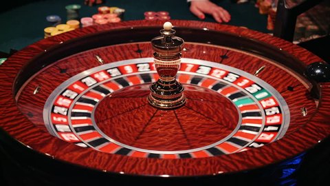 The small ball falls into the slot as the Roulette Wheel spins.