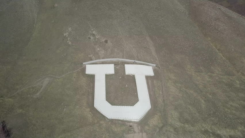 SALT LAKE CITY, UTAH - MAR 2017: Aerial University of Utah mountain letter pull back. One of the highest educational rated ranking. The university was established in 1850. Research school.